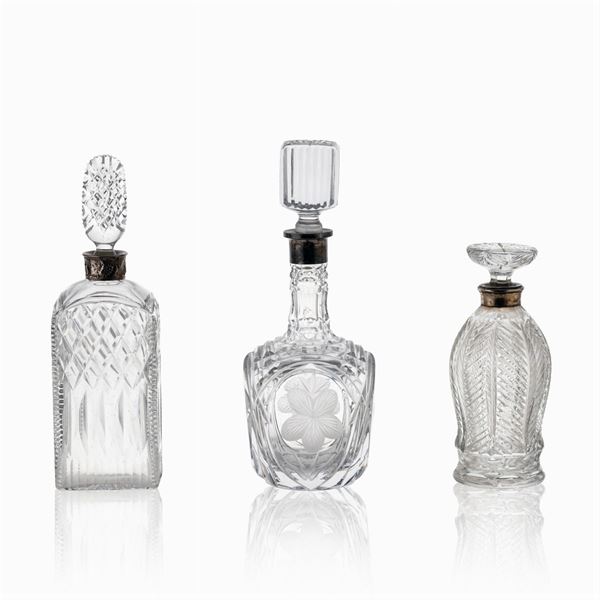 Group of transparent cut crystal bottles (3)