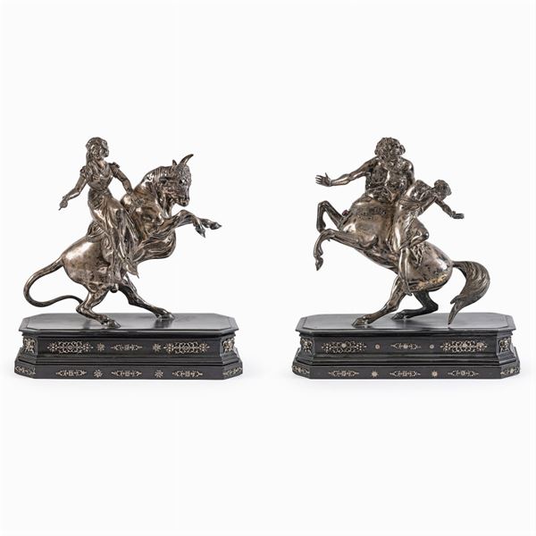 Coppia di sculture in argento e pietre semipreziose