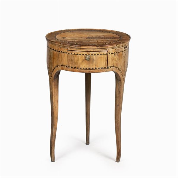Walnut and different woods table