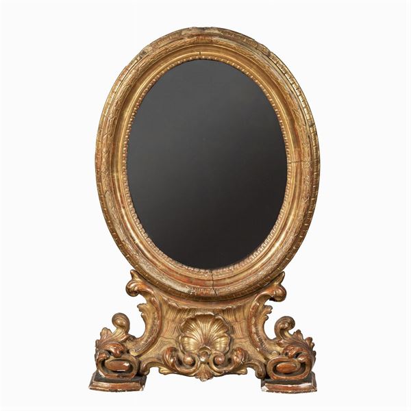 Specchiera in legno dorato ed intagliato
