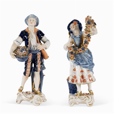 Coppia di Sculture in Porcellana Policroma