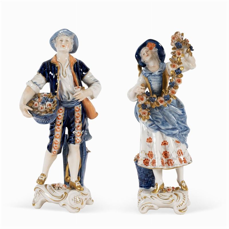 Coppia di Sculture in Porcellana Policroma