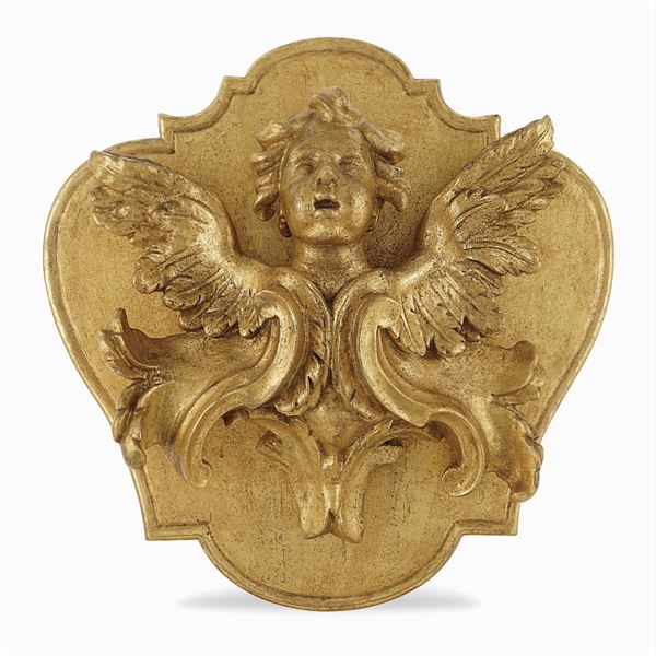 Fregio in legno intagliato e dorato