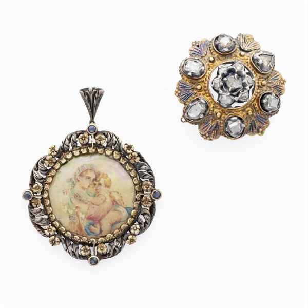 Pendente e spilla in oro giallo e argento con rose di diamante