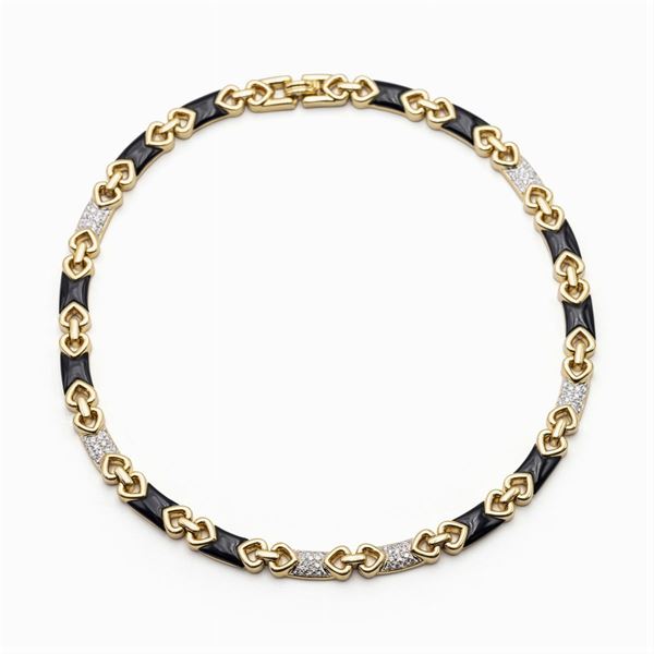 Girocollo in oro giallo 18kt con diamanti e onice nero
