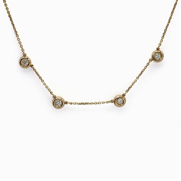 Collana in oro giallo 14kt con quattro diamanti