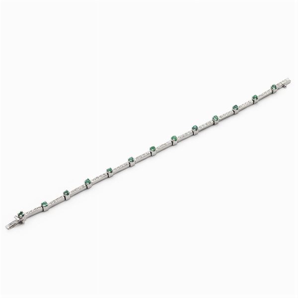 18kt white gold, diamonds and emeralds tennis bracelet