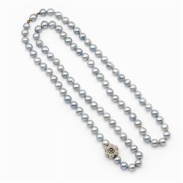 Long  strand of cultured gray pearls necklace