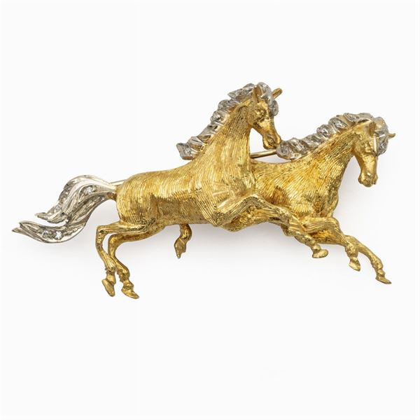 Spilla cavalli in oro giallo e bianco 18kt