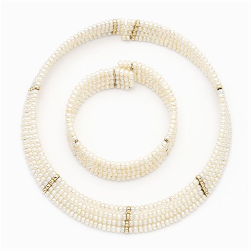 Choker e Bracciale a Manetta a Quattro Fili di Perle