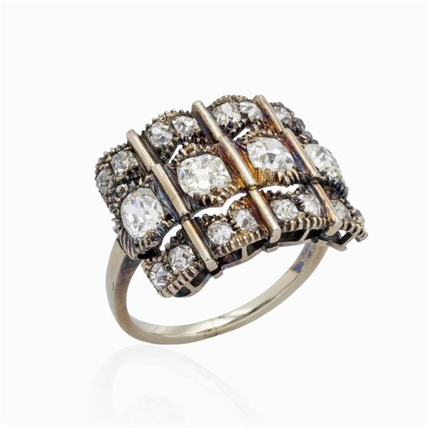 Anello a fascia in oro e argento con rose coroné