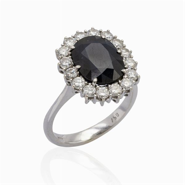 Anello in oro bianco 18kt zaffiro e diamanti