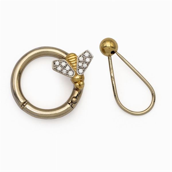 Pomellato, two 18kt yellow gold  key rings
