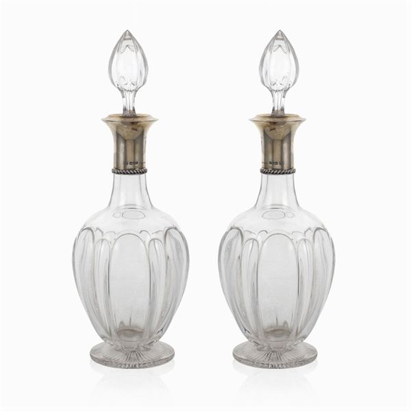 Pair of cut crystal and silver bottles
