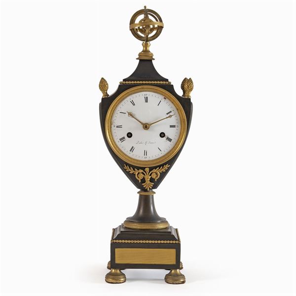 Burnished and gilded bronze table clock