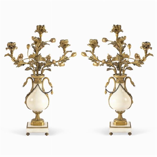 Pair of gilded bronze and white marble candelabra