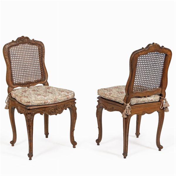 Eight carved beech wood chairs