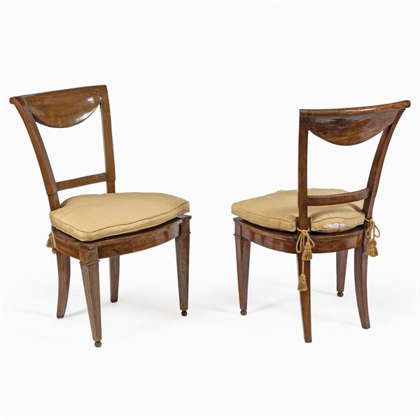 Four walnut wood chairs