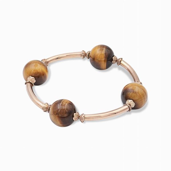 Bracciale a manetta in oro rosa 18kt e occhio di tigre