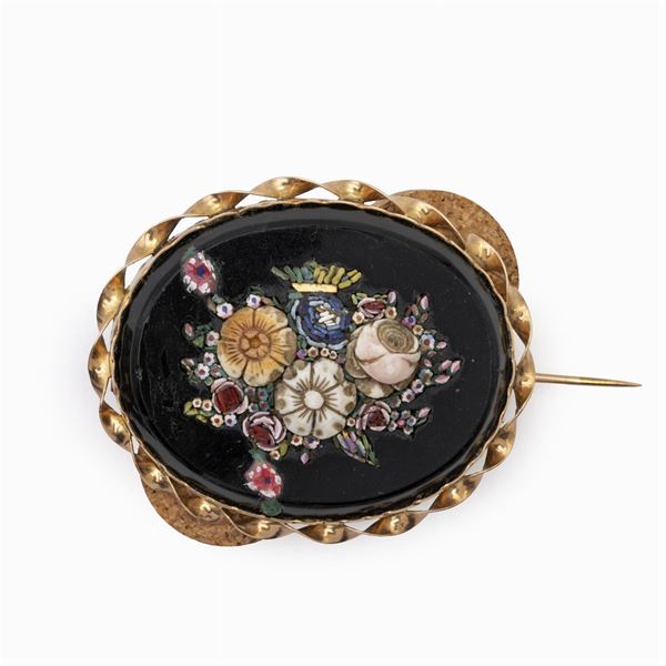 Spilla in oro rosa 18kt a motivo floreale