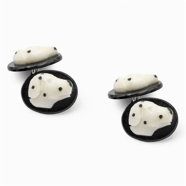 Gemelli testa dalmata in oro bianco 18kt