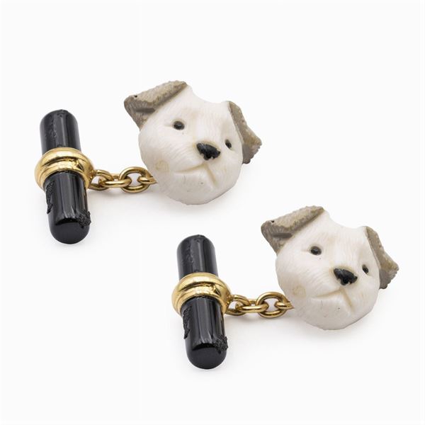 Gemelli testa bobtail in oro giallo 18kt
