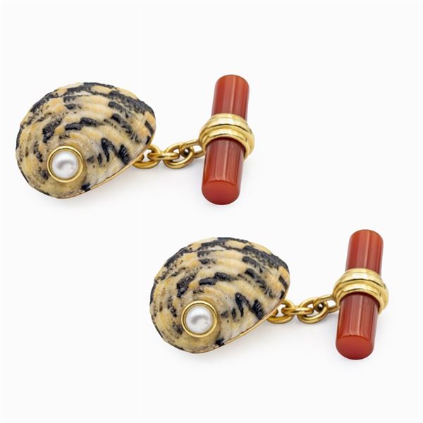 Gemelli conchiglie in oro giallo 18kt