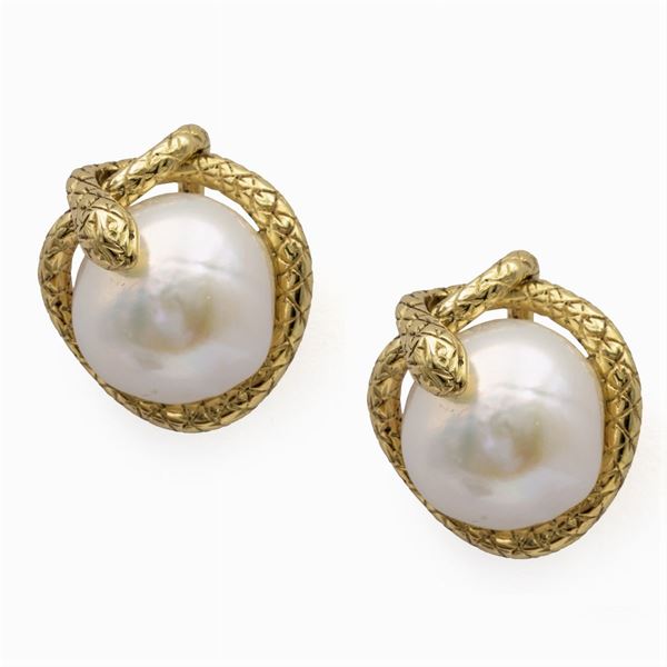 Orecchini a lobo serpenti in oro giallo 18kt
