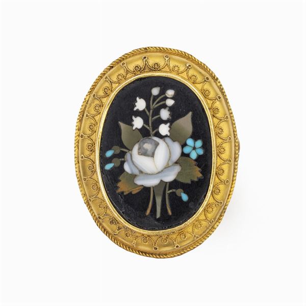 Spilla in oro giallo 14kt e pietre dure a motivo floreale