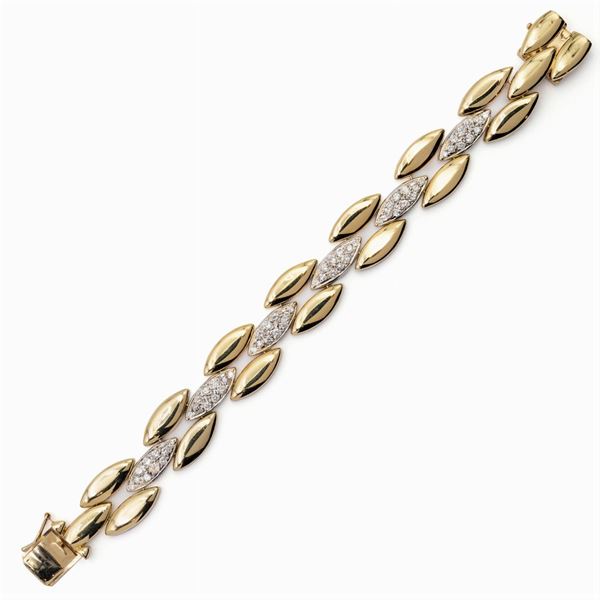 Bracciale in oro giallo e bianco 14kt e diamanti