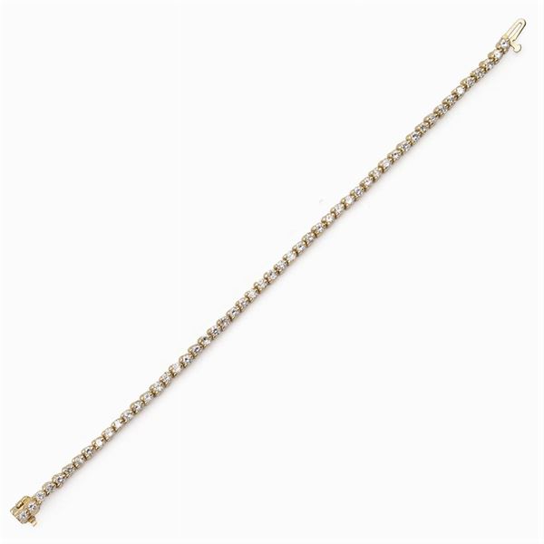 Bracciale tennis in oro giallo 14kt e diamanti