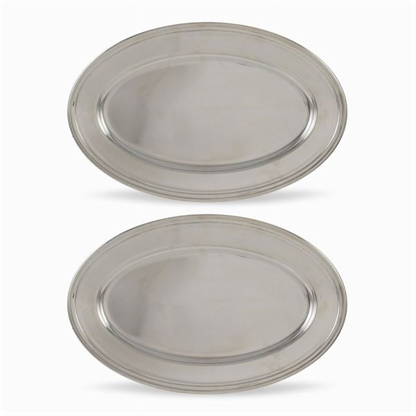 Pair of oval-shaped silver-plated metal serving plates
