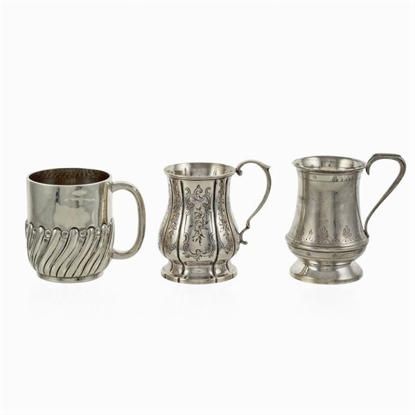 Three silver mugs
