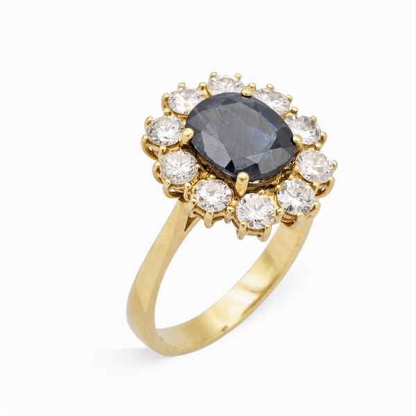 Anello in oro giallo 18kt zaffiro e diamanti