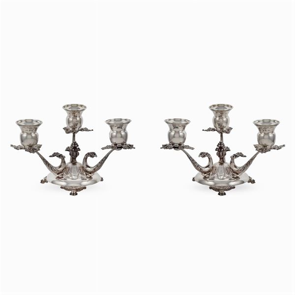 Pair of three-light silver candlesticks (2)
