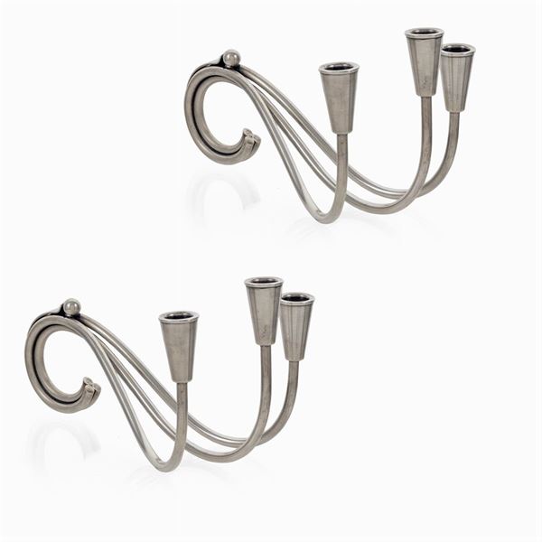 Pair of three-light silver-plated metal candlesticks