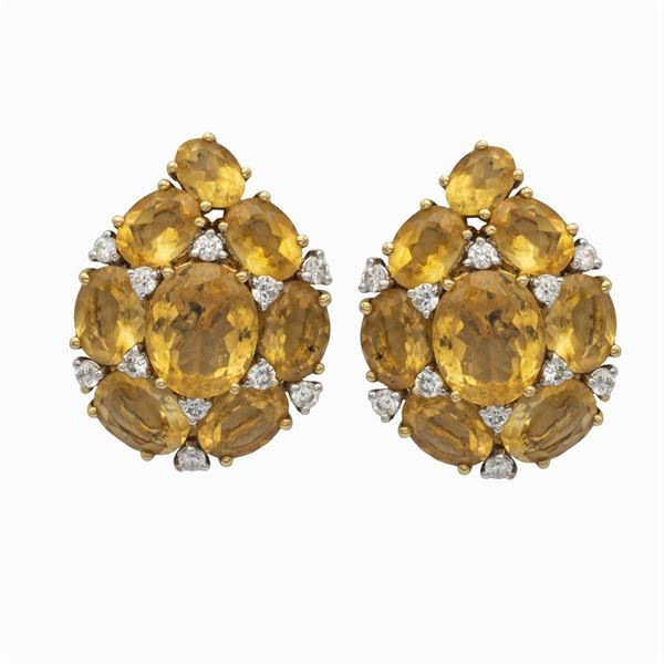 Orecchini a lobo in oro giallo e bianco 18kt