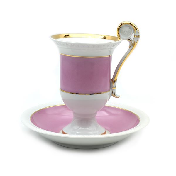 Polychrome porcelain cup and saucer