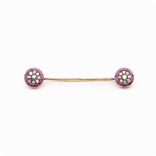 Yellow gold and silver brooch