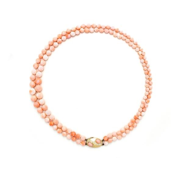 Two strands of pink coral necklace