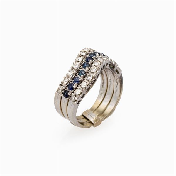 18kt white gold, diamonds and sapphires three riviere ring