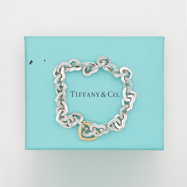 Tiffany & Co. silver and 18kt yellow gold hearts bracelet (signed ...