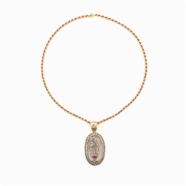 Gold and silver rock crystal and diamond roses pendant