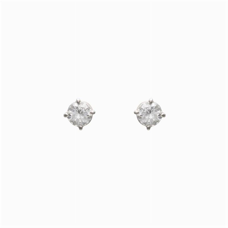Orecchini a Lobo in Oro Bianco 18kt e Due Diamanti
