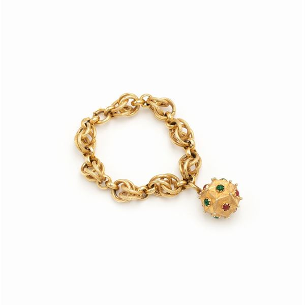 Bracelet in 18kt yellow gold with mine pendant