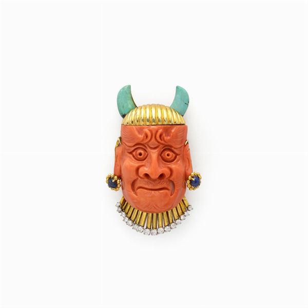 Trio Inca mask coral brooch