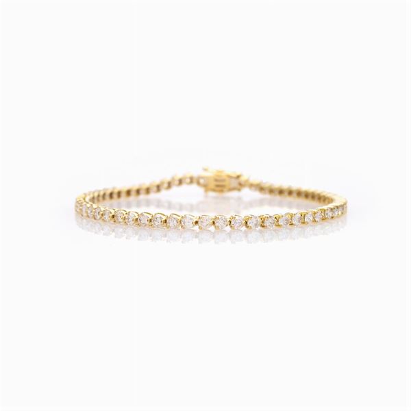 Bracciale tennis in oro giallo 18kt e diamanti