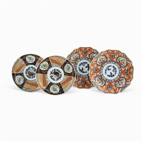 Group of four Imari porcelain plates