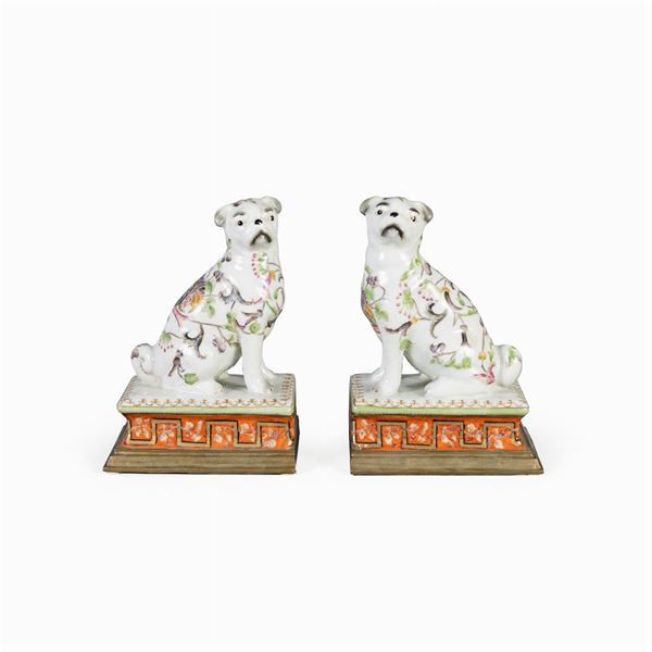 Coppia di sculture in ceramica policroma