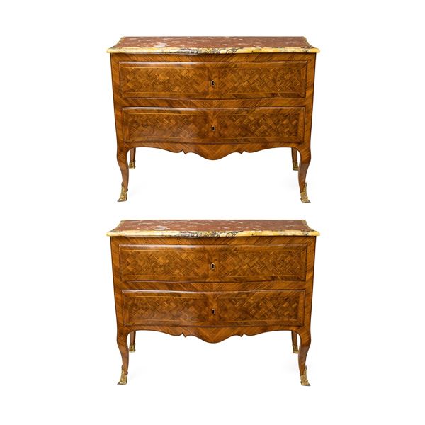 Pair of chests of drawers in various woods